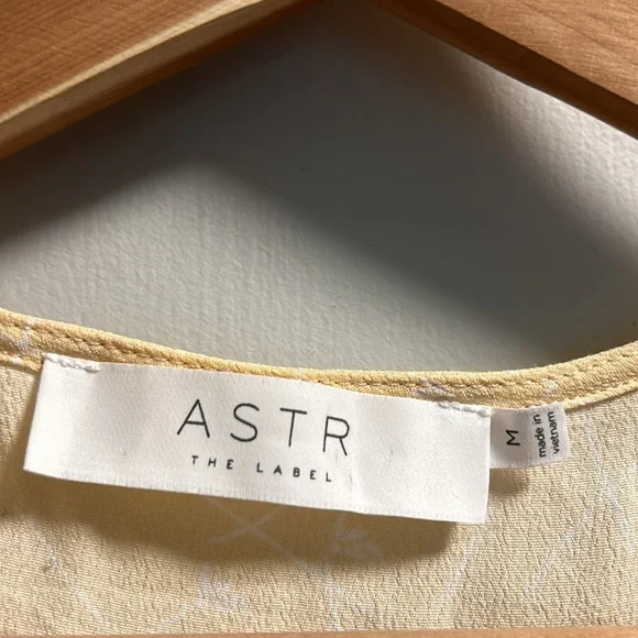 Pastel yellow with delicate white floral print. Flowy sleeves. Cropped. - Picture 2 of 3